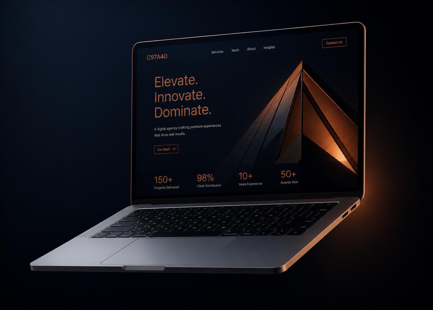 Laptop showing a modern dark website designed by Harrall Studio